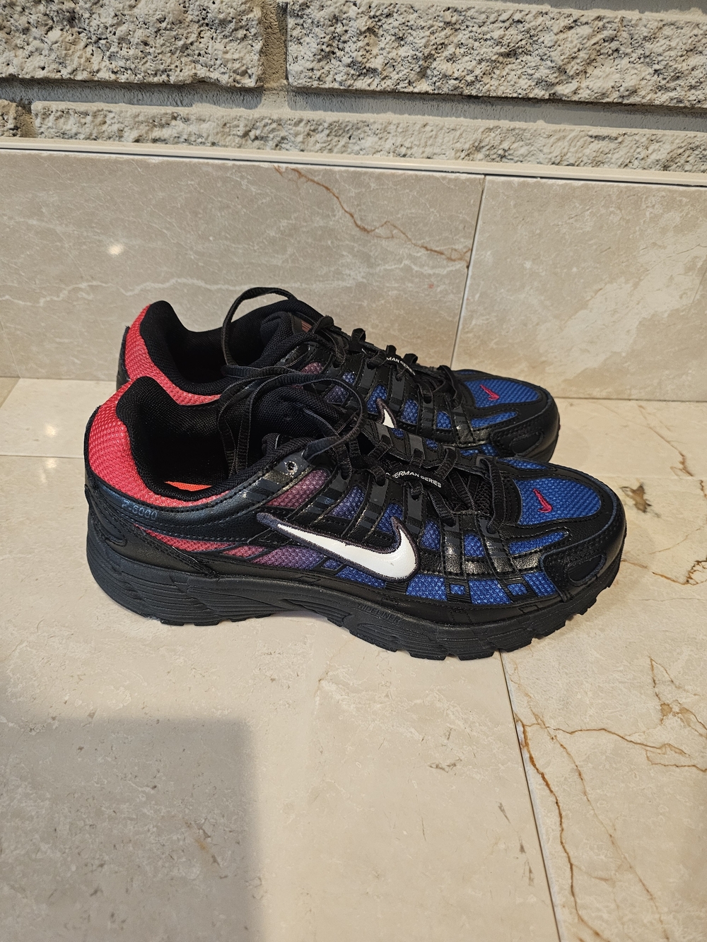 Nike Women’s Black/Blue Running Sneakers with Pink Accent
